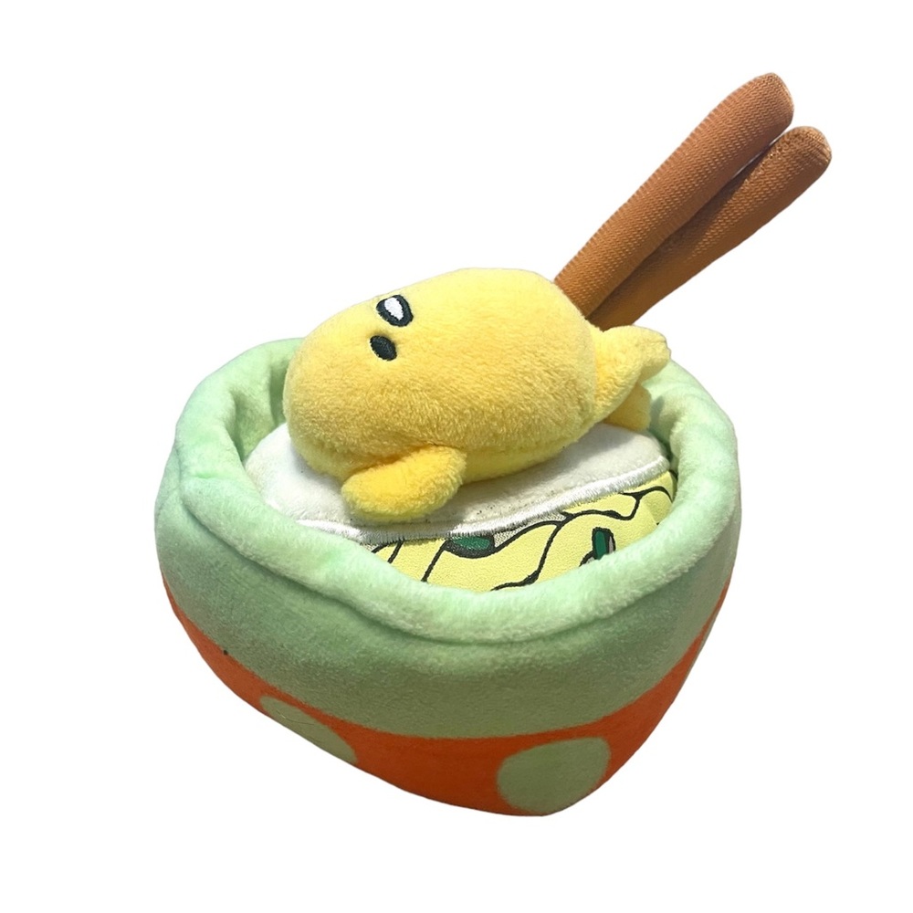 Gudetama “the lazy egg” in a bowl of noodle with chopsticks